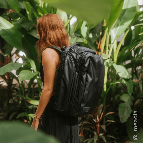 girl-wearing-35l-black-transit-travel-backpack-variant_ids-40190470717520